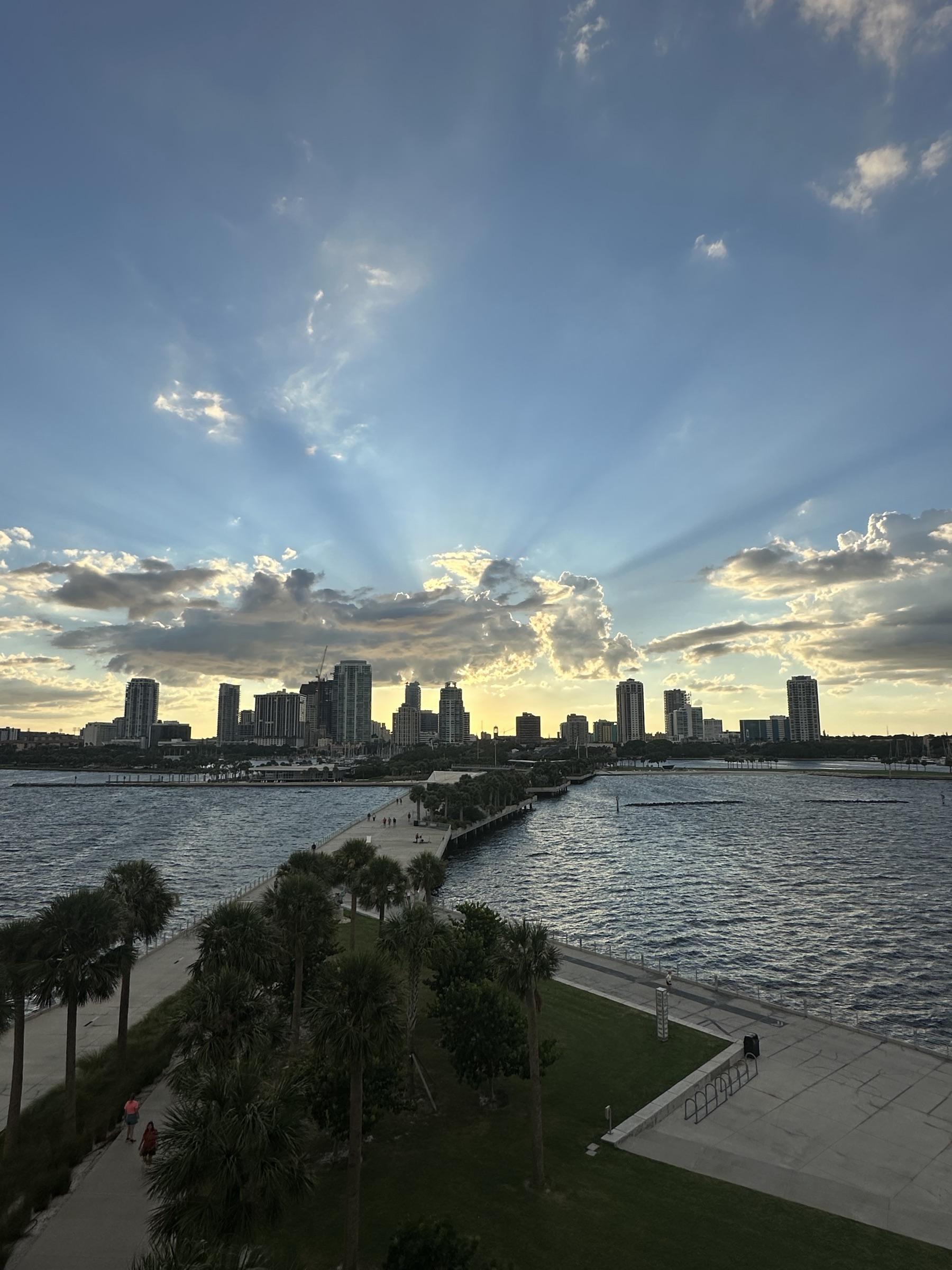 Golden-hour clouds over the St Pete waterfront.